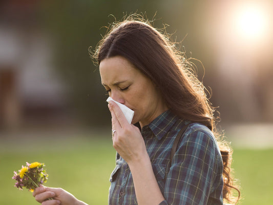 woman suffering from seasonal allergies