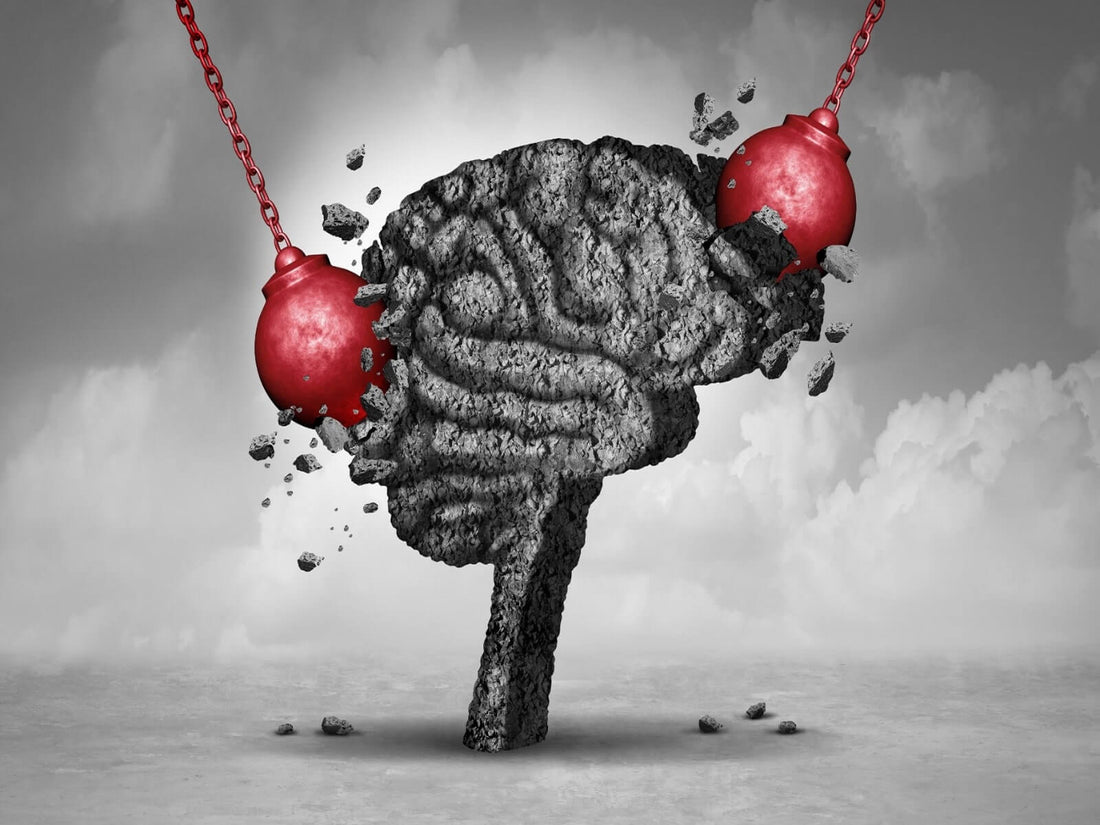 brain with wrecking ball depicting migraines